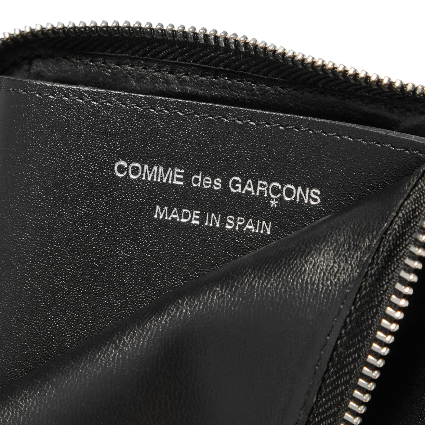 Comme Des Garcons Silver Eyelet