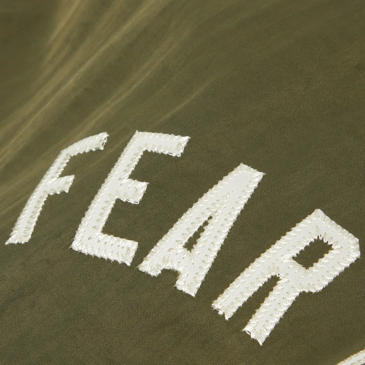 Fear of God Essentials Textured Nylon Hooded Coaches Jacket